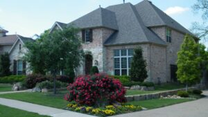 Suburban house with flower garden